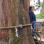 May 20-Shinano Forest Therapy, Togakushi Shrine boy leaning against power tree-155dpi